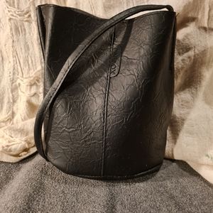 Xovino black PU leather bucket crossbody
